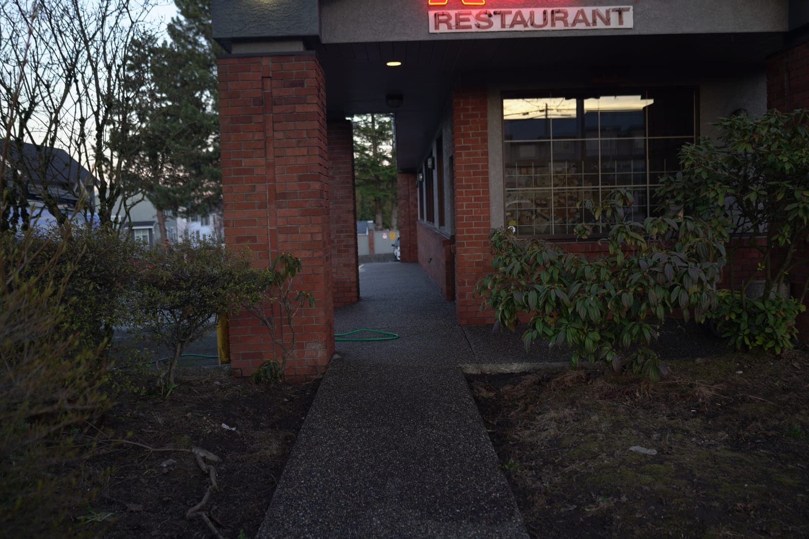 A cleaned commercial building entrance and walkway