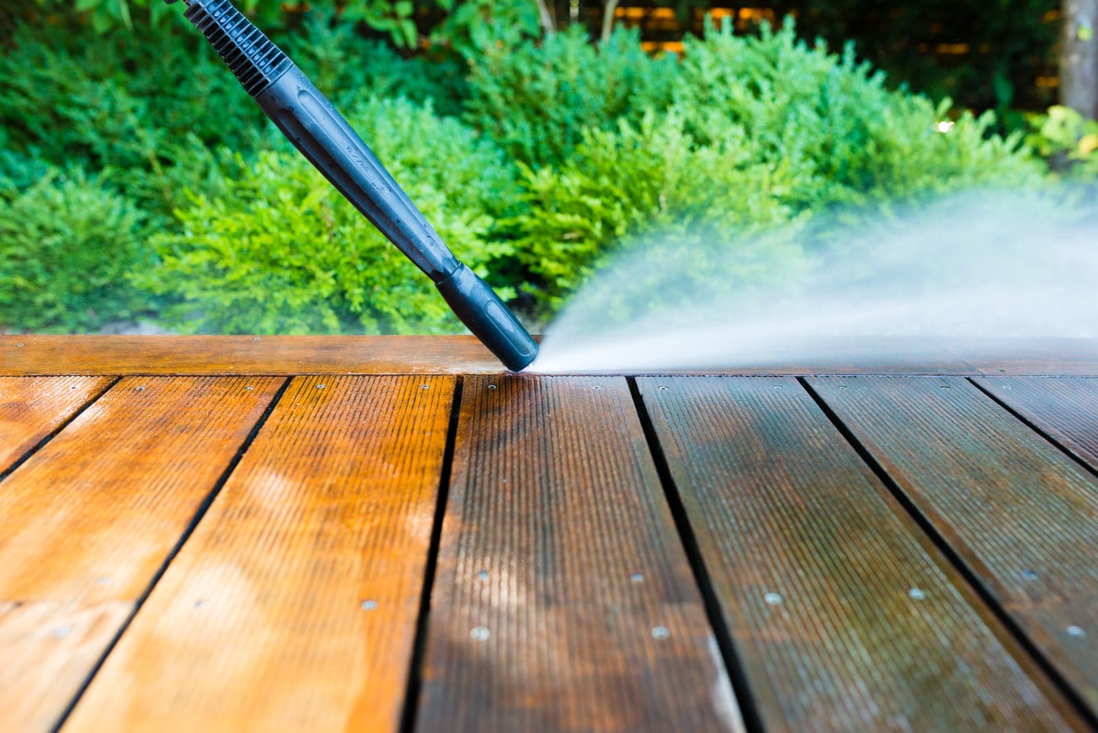 Cleaning wood deck boards, the kind of surface around a hot tub