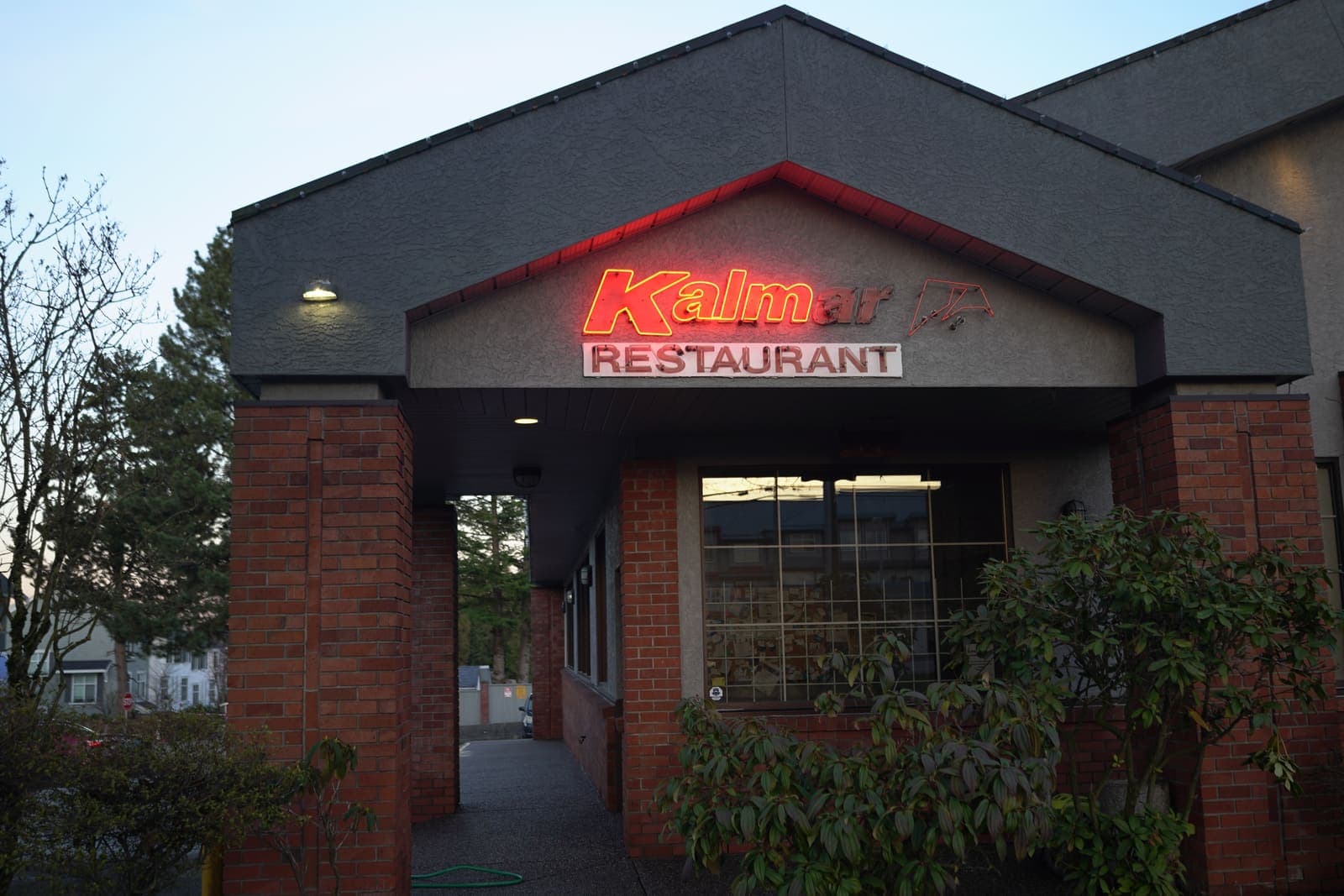Restaurant brick entrance and walkway after exterior cleaning