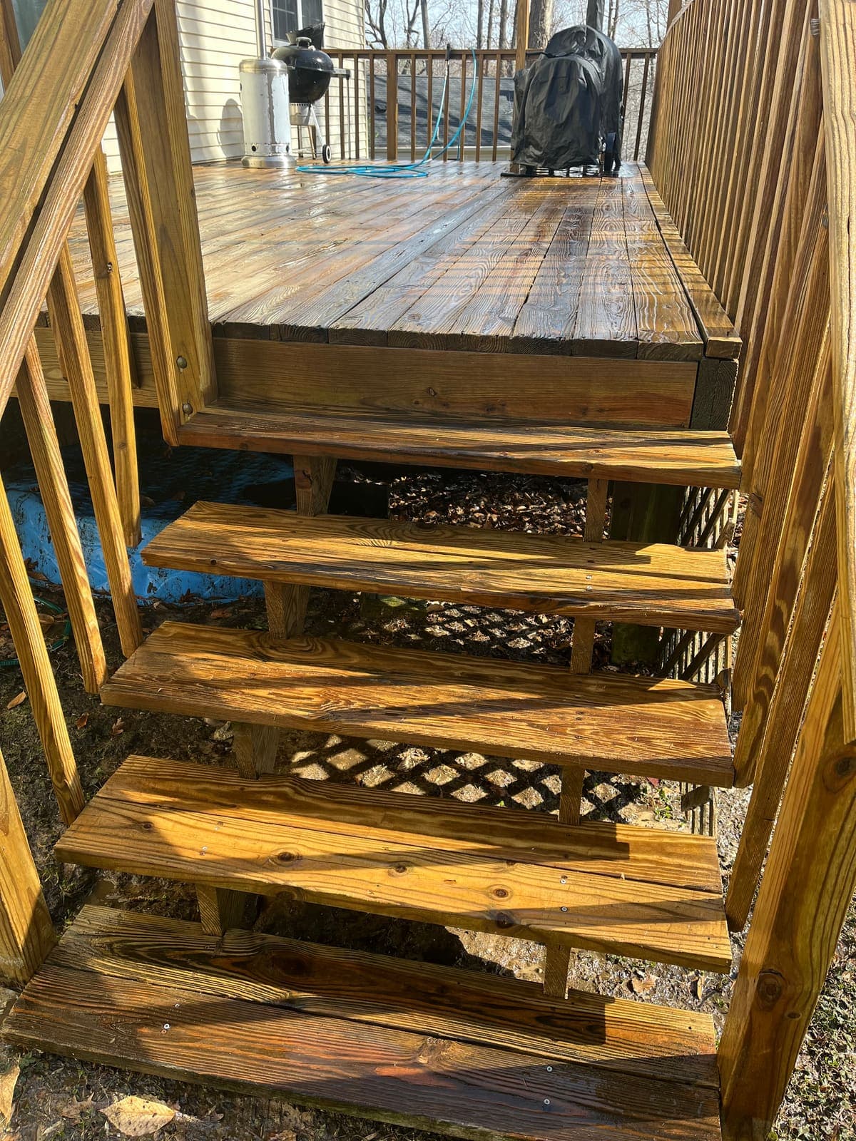 Wood deck stairs restored to warm colour after cleaning