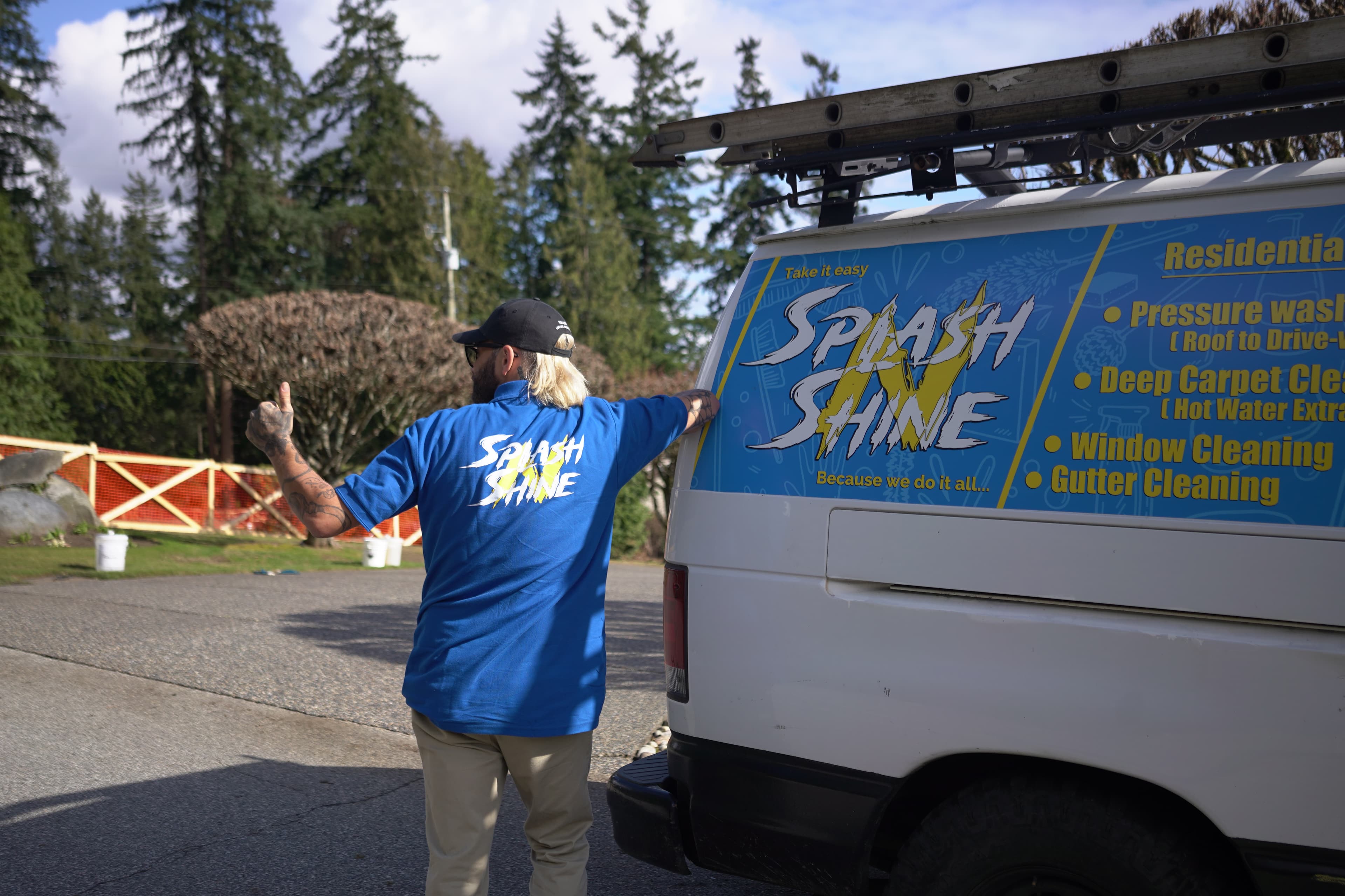 A Splash N Shine van at a residential property, ready for seasonal work